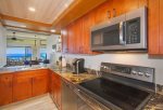 New GOLD remodeled Kitchen with custom cabinets and granite counters